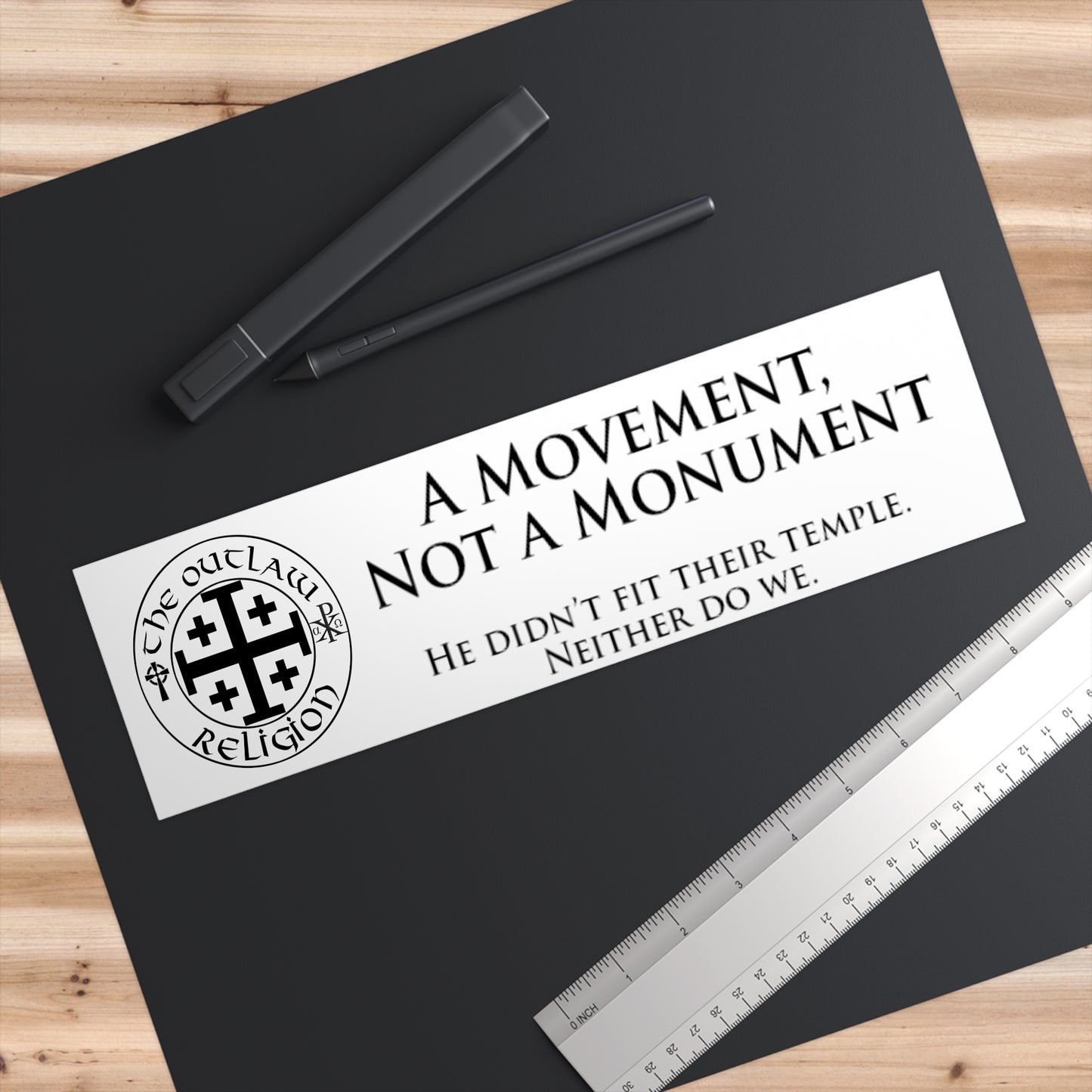 Bumper Sticker — "A Movement, Not a Monument" (Outlaw Religion Logo)